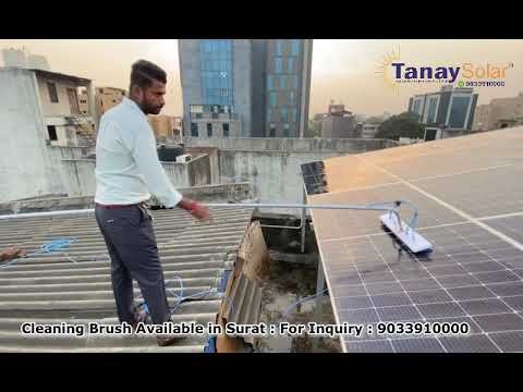 cleaning solar light lens with soft brush and microfiber cloth